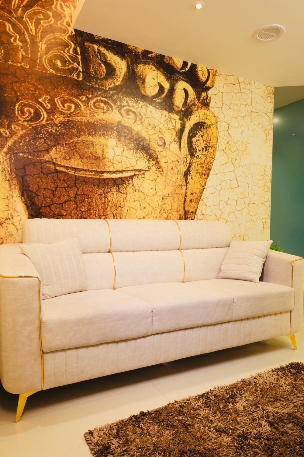 Serene treatment room with gold accents